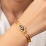 Large Gold Evil Eye Dual Brass Cuff Bracelet, thumbnail 1 of 4