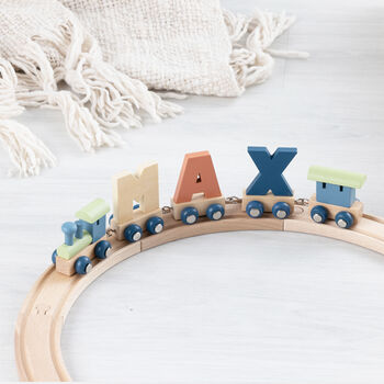 Engraved New Baby Polar Wooden Name Train, 10 of 12