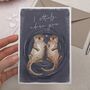 Traditional Otters Holding Hands Valentine's Card, thumbnail 2 of 2