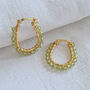 Peridot And Gold Wire Wrapped Hoop Earrings, thumbnail 1 of 6