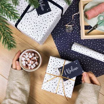 'I Believe' Christmas Stars Navy Wrapping Paper, 10 of 12
