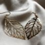 Dainty Statement Gold Leaf Earrings, thumbnail 1 of 3