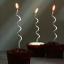 G Decor Set Of Twelve Silver Swirls Cake Candles, thumbnail 1 of 3