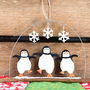 Three Dancing Christmas Penguins Hanging Decoration, thumbnail 1 of 2