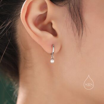 Asymmetric Pearl Huggie Hoops Earrings With Cz Crystals, 2 of 11