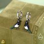 Sterling Silver Magpie Enamel Huggie Hoop Earrings, thumbnail 1 of 9