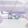 Blue Topaz Emerald Cut Pendant Necklace In Sterling Silver And Gold, thumbnail 3 of 11