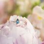 Solid Gold And Silver Blue Topaz Birthstone Alice Ring, thumbnail 6 of 10