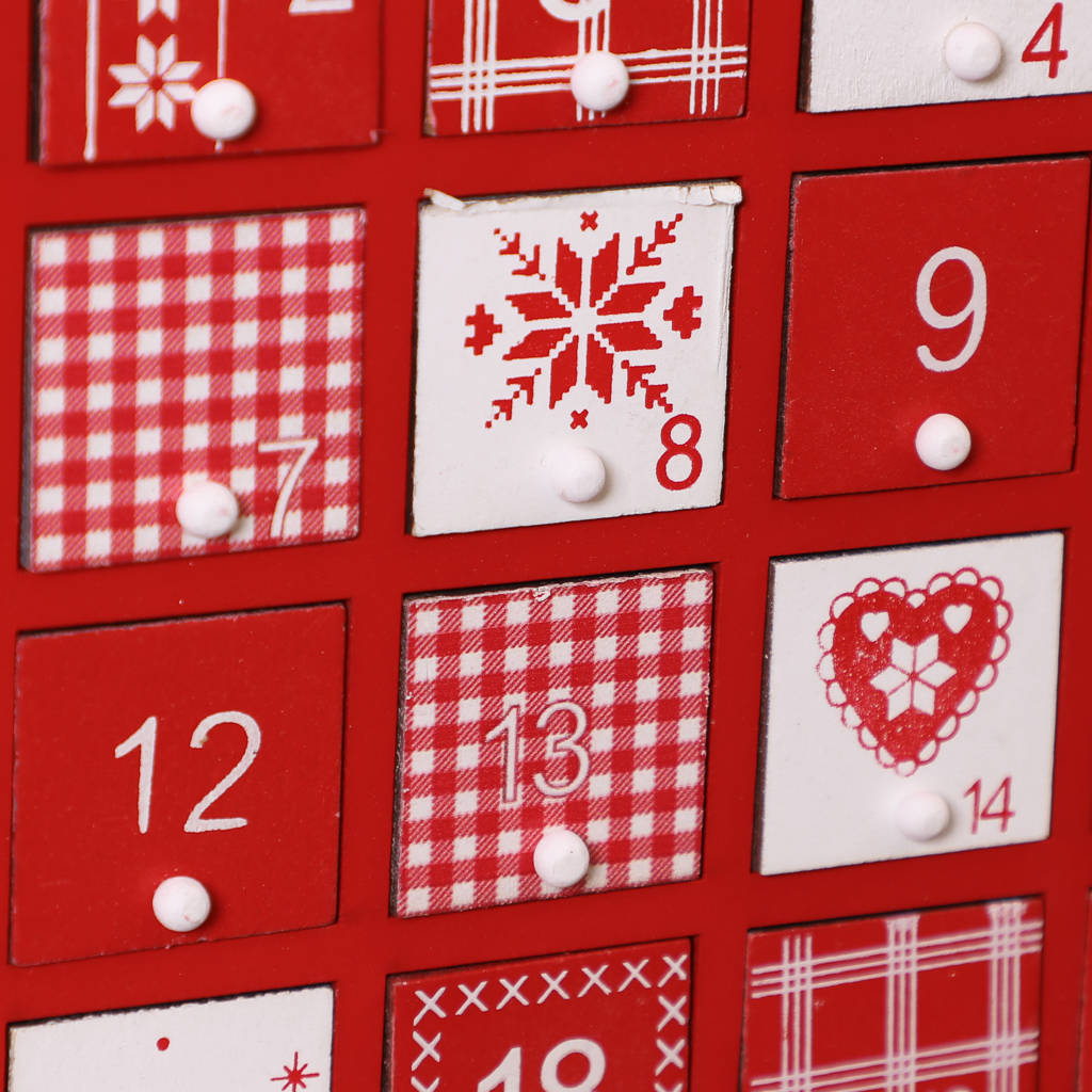 red and white festive print advent calendar by dibor