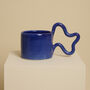 Blue Handmade Ceramic Mug With Wiggle Handle, thumbnail 1 of 6