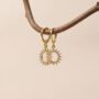 Solstace | Delicate Huggie Hoop Sun Charm Earrings, thumbnail 2 of 4