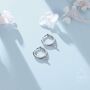 Sterling Silver Extra Tiny Amethyst Purple Cz Huggie Hoop Earrings, thumbnail 1 of 9