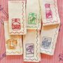 Set Of Six Embroidered Christmas Condiment Napkins, thumbnail 1 of 11