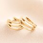 Stainless Steel Illusion Huggie Hoop Earrings In Gold, thumbnail 1 of 4