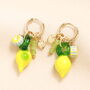 Stainless Steel Lemon Charm Hoop Earrings In Gold Plating, thumbnail 1 of 2