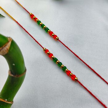 Red Beads Slim Thread Rakhi For Raksha Bandhan, 8 of 8