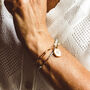 Crystal Faceted Bracelet With 18 K Gold Plated Accent Beads And Charms, thumbnail 4 of 9