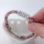 Women's Rainbow Cord Bracelet With Personalised Rings, thumbnail 1 of 6