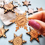 Wooden Personalised Couples Christmas Snowflake Tokens, thumbnail 1 of 4