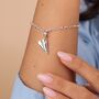 Sterling Silver Paper Plane Charm Bracelet, thumbnail 1 of 6