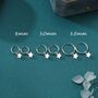 Sterling Silver Delicate Star Huggie Hoop Earrings, thumbnail 1 of 12