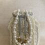 Handcrafted Ivory Pearl Potli With Pearl Wrist Chain, thumbnail 6 of 9