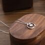 Sterling Silver Genuine Moissanite And Mobius Circle Pendant Necklace, thumbnail 2 of 10