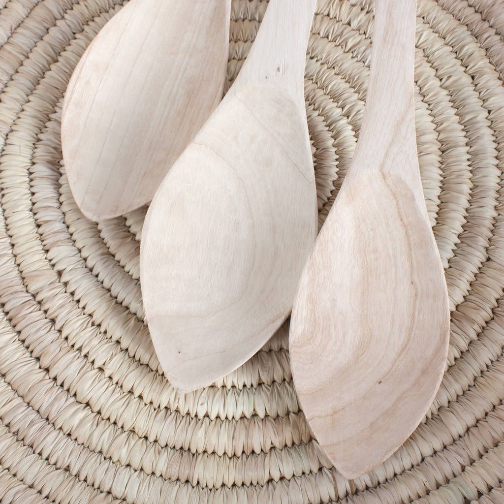 hand carved elm wood serving spoon by bohemia