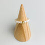 Dainty Pearl Stretch Ring With Sterling Silver Bead, thumbnail 2 of 6