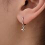 Sterling Silver Tiny Four Point Star Huggie Hoop Earrings, thumbnail 1 of 11