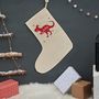 Personalised Christmas T Rex Stocking, thumbnail 1 of 4