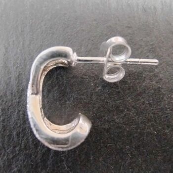 Sterling Silver Kiss Cross Huggie Earrings, 3 of 3