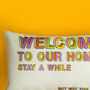 'Welcome to Our Home' Humorous Decorative Cushion, thumbnail 2 of 5