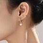 Asymmetric Natural Pearl Huggie Hoops Earrings, thumbnail 4 of 11