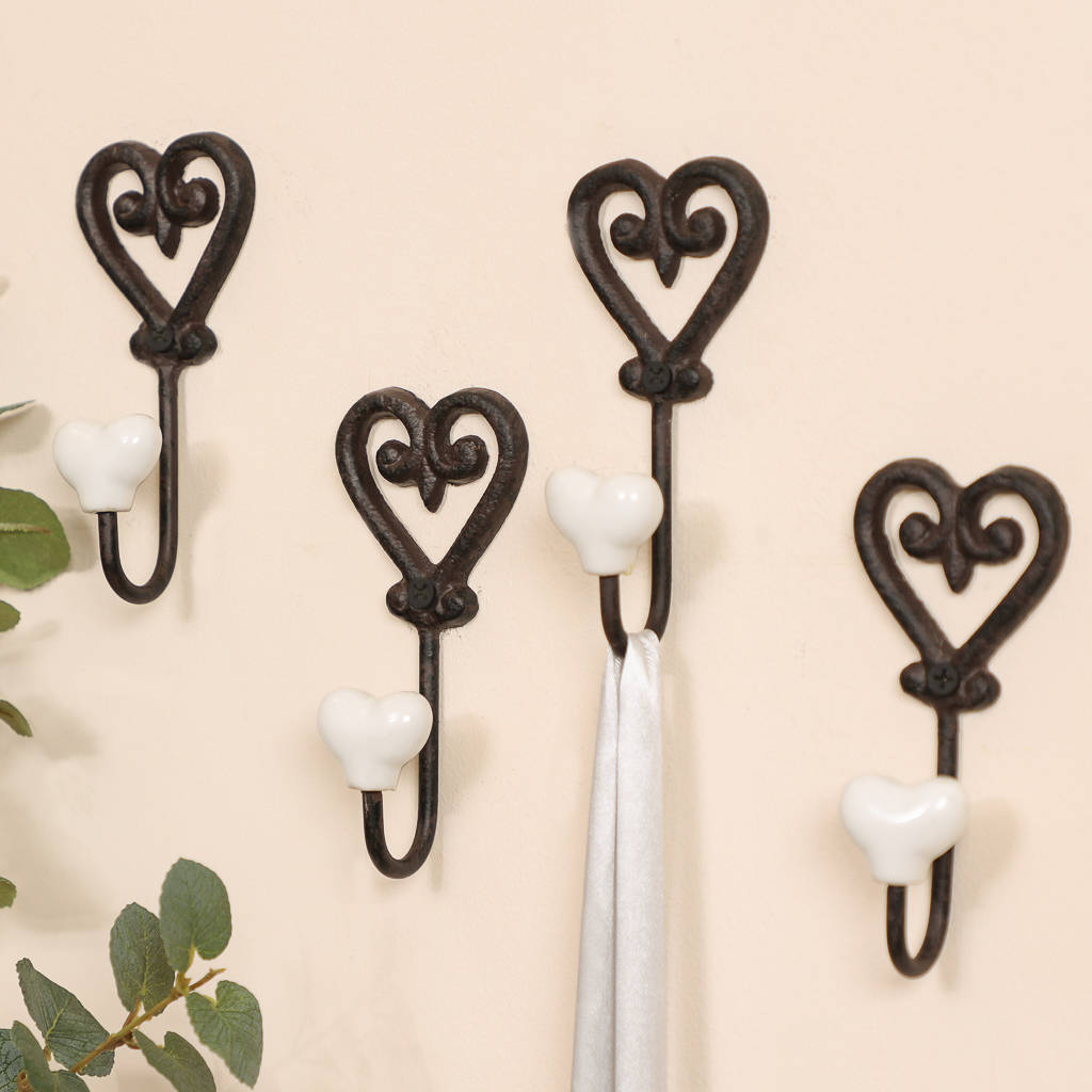 set of four cast iron heart hooks by dibor