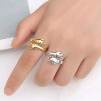 Gold Hand Love Hugging Couple Stackable Love Ring, 2 of 2