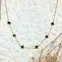 Six Small Clover Necklace In Black And Gold, thumbnail 3 of 4