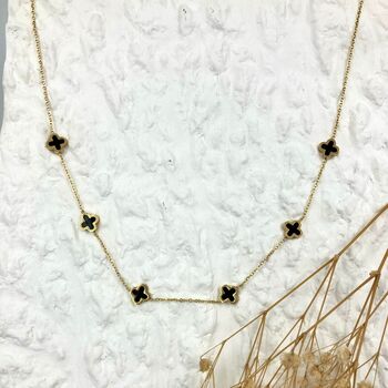 Six Small Clover Necklace In Black And Gold, 3 of 4