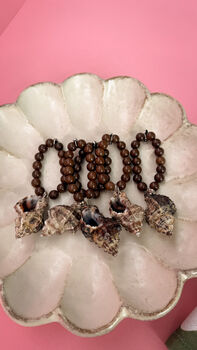 Set Of Two Handmade Sea Shell Napkin Rings With Wooden Beads, 9 of 9