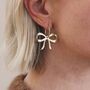 Golden Bow Hoop Earrings, thumbnail 1 of 4