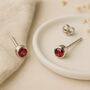 Sterling Silver January Garnet Birthstone Stud Earrings, thumbnail 1 of 6