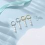 Sterling Silver Natural Oval Pearl Trio Huggie Hoop Earrings, thumbnail 4 of 11