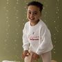 Personalised Name Believes Children's Christmas Knitted Jumper, thumbnail 1 of 6