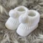 White Knitted Baby Booties With Pom Pom, thumbnail 5 of 9