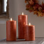 Tru Glow® Mottled Orange LED Chapel Candle Trio, thumbnail 1 of 4