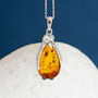Sterling Silver Baltic Amber Penguin Necklace, thumbnail 1 of 11