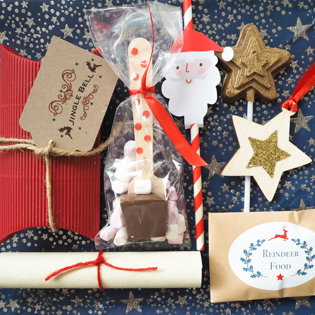 christmas eve box with contents and chocolate by twinkleboxco | notonthehighstreet.com