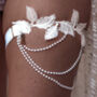 Luxury Dove Feather Wedding Garter With Pearls, thumbnail 1 of 5