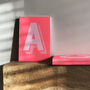 Vibrant Pink And White Initial Personalised Notebook, thumbnail 1 of 3