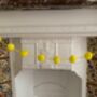 Three Strands Of Yellow Pompom Garlands, thumbnail 1 of 7